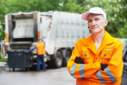 Modern machinery used for garden waste removal in Morden